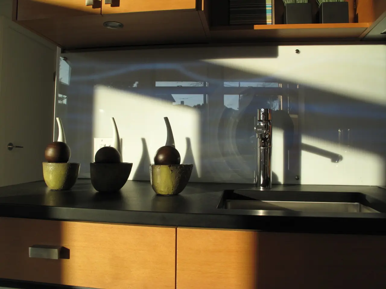 Nate Berkus employs a traditional vintage item for expanding kitchen storage in compact layouts,...
