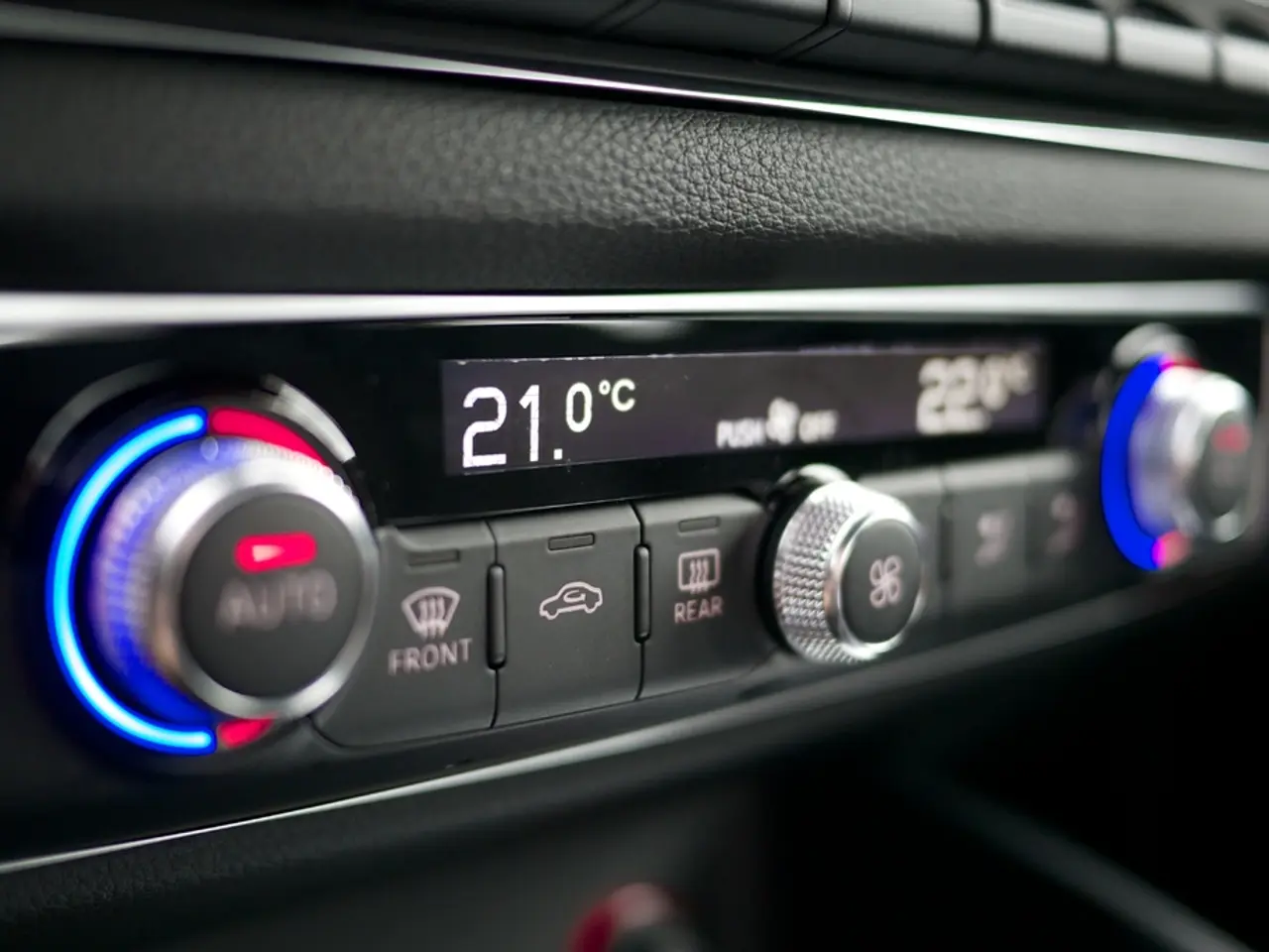 In this picture we can see few buttons, regulators and lights, in the middle of the image we can...