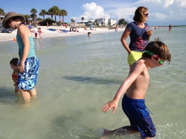 Captured Moment of a Family's Shape Against Backdrop of Beach Artwork